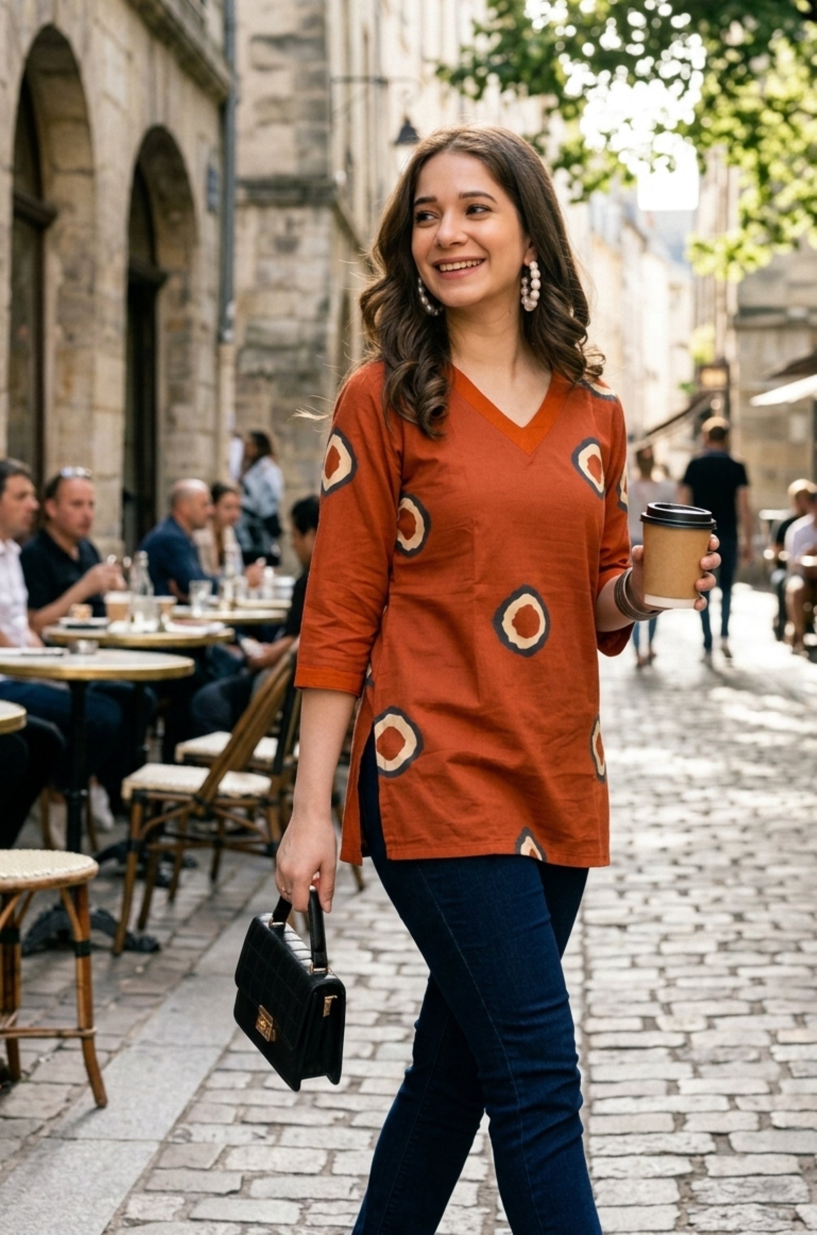 Orange Circular Print Pure Cotton Short Kurti.