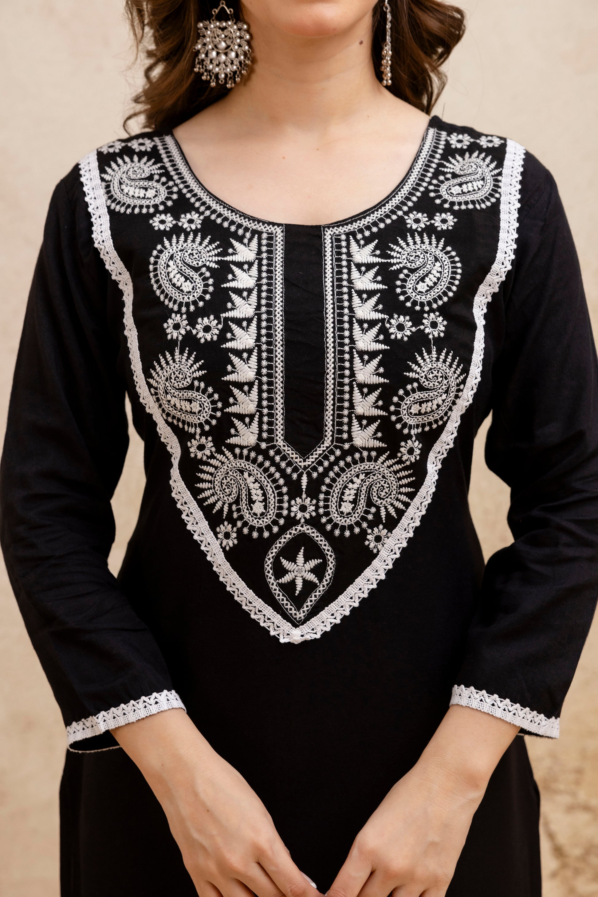 Black Solid Embroidered Yoke Straight Kurta.