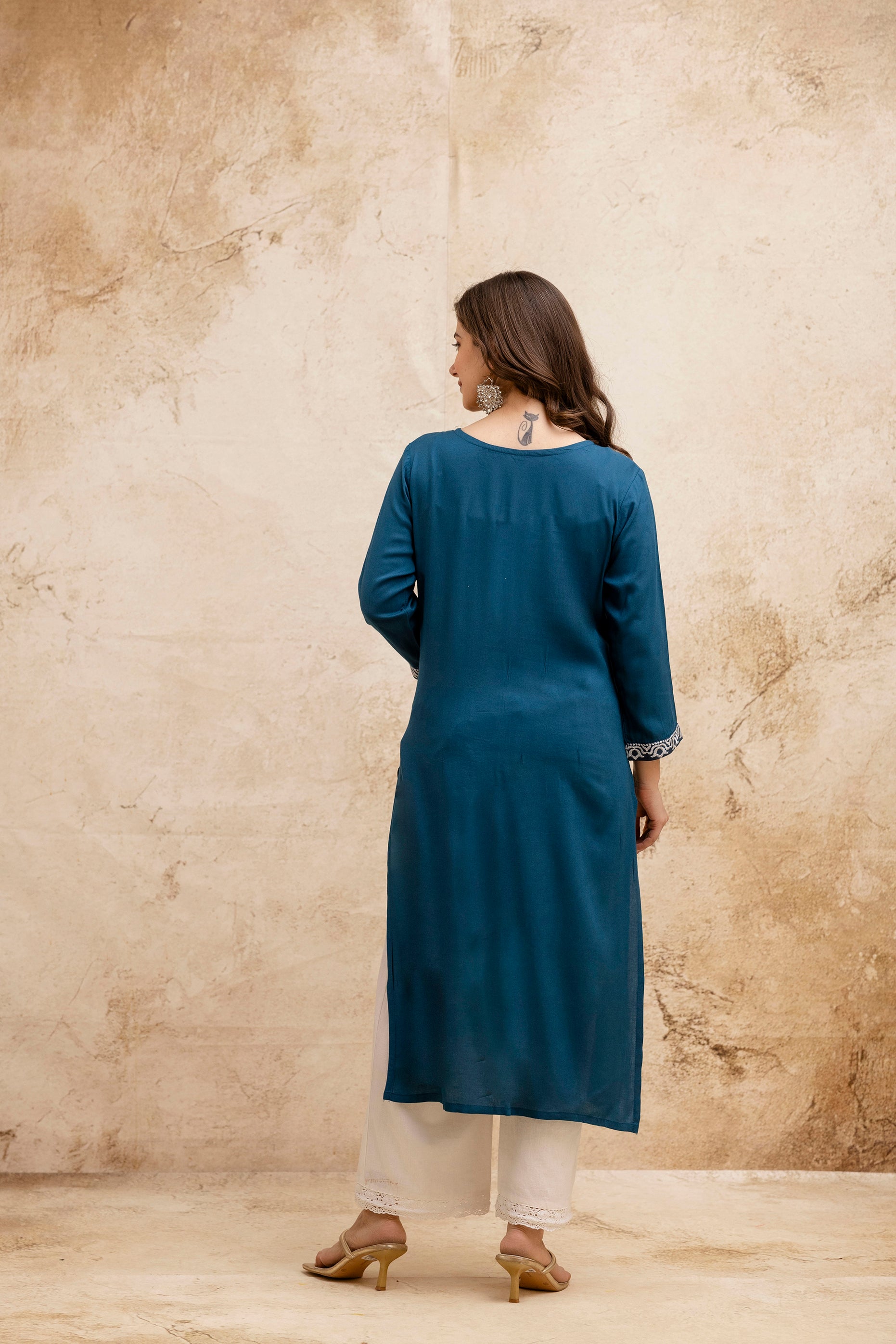 Teal Solid Embroidered Straight Kurta.
