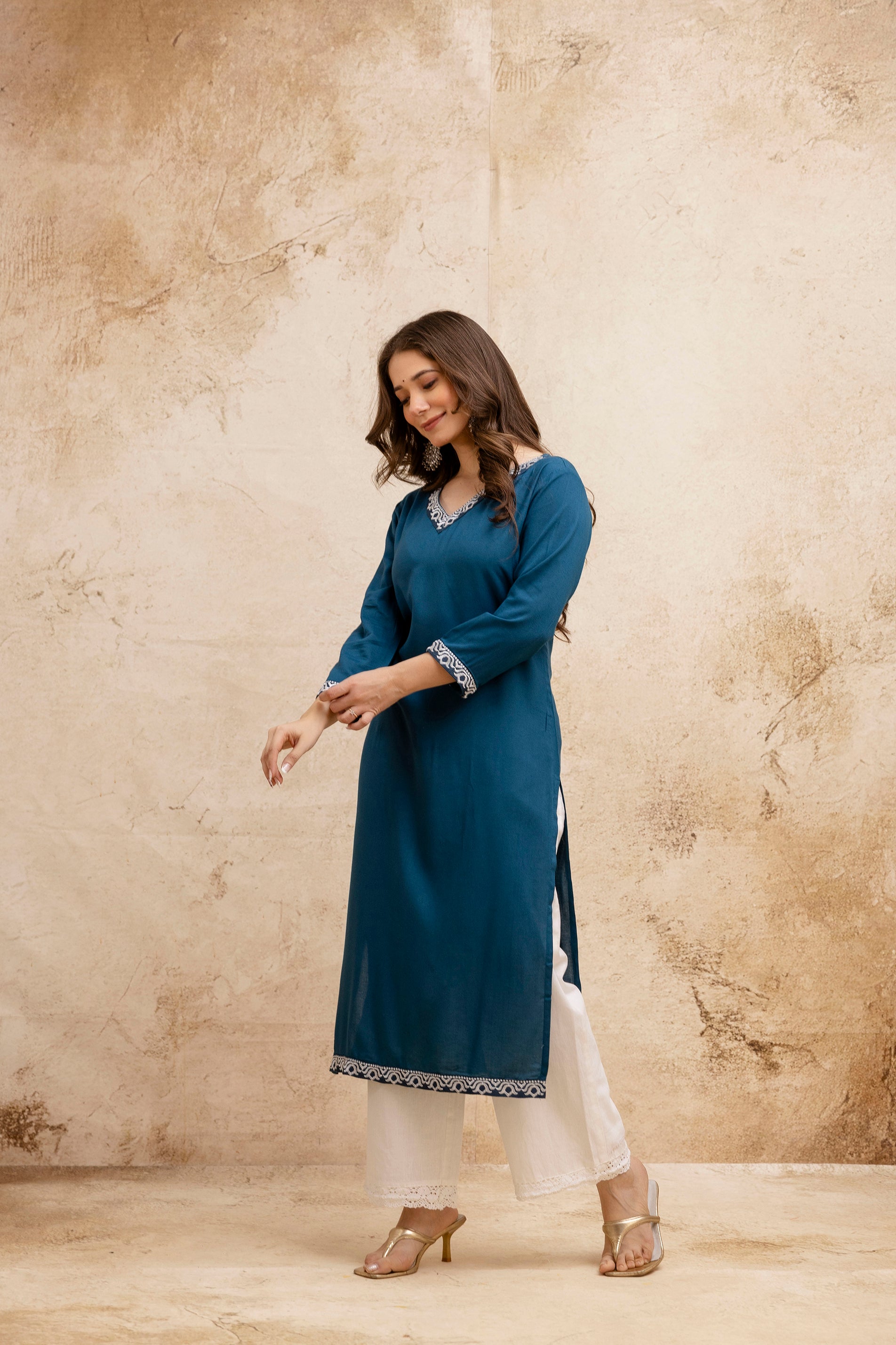 Teal Solid Embroidered Straight Kurta.