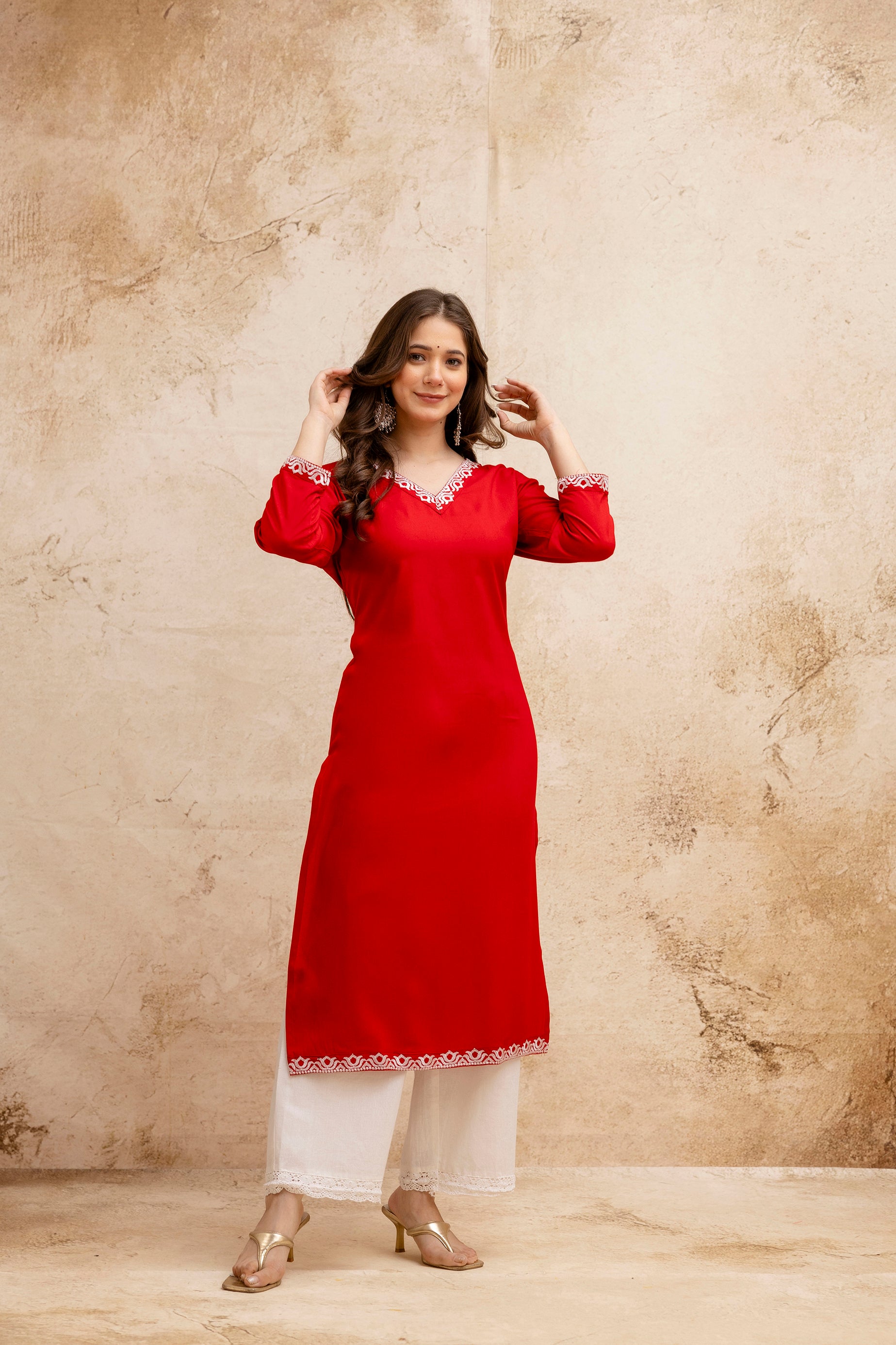 Red Solid Embroidered Straight Kurta.