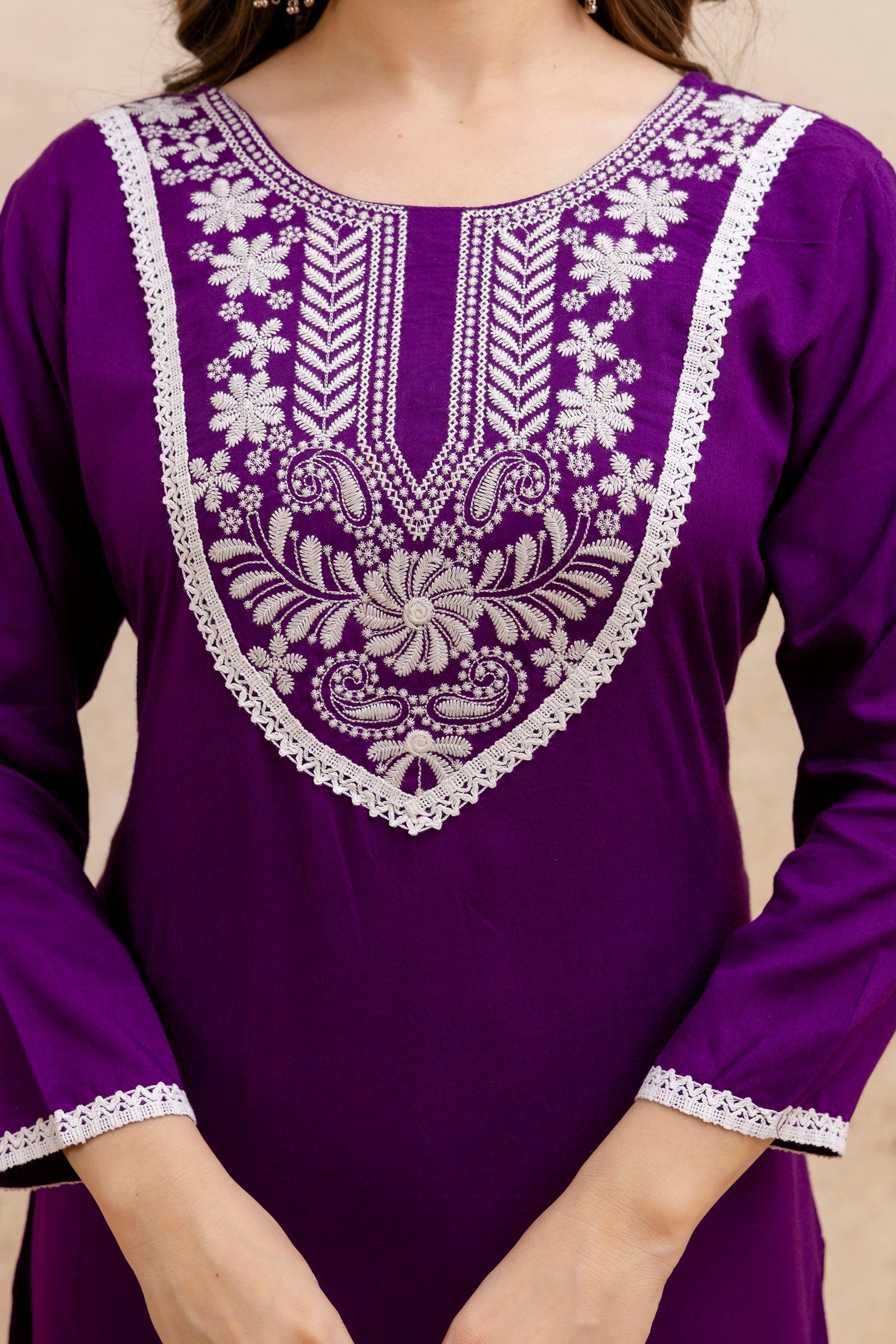 Purple Solid Embroidered Yoke Straight Kurta.