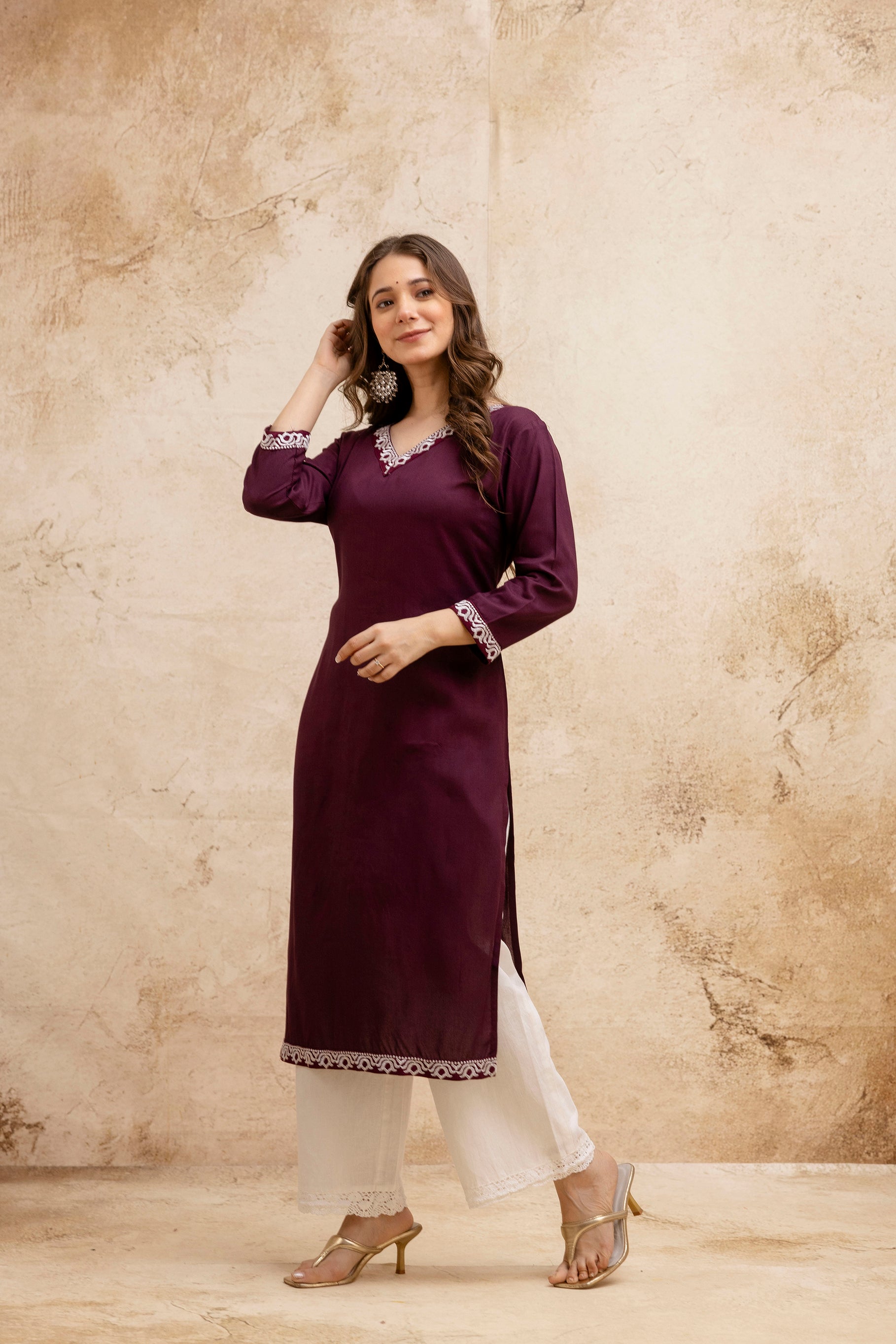 Maroon Solid Embroidered Straight Kurta.