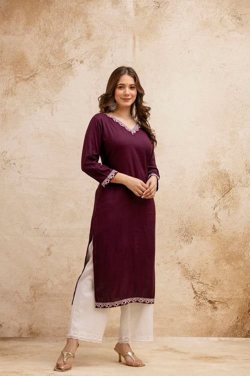 Maroon Solid Embroidered Straight Kurta.