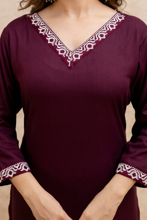 Maroon Solid Embroidered Straight Kurta.