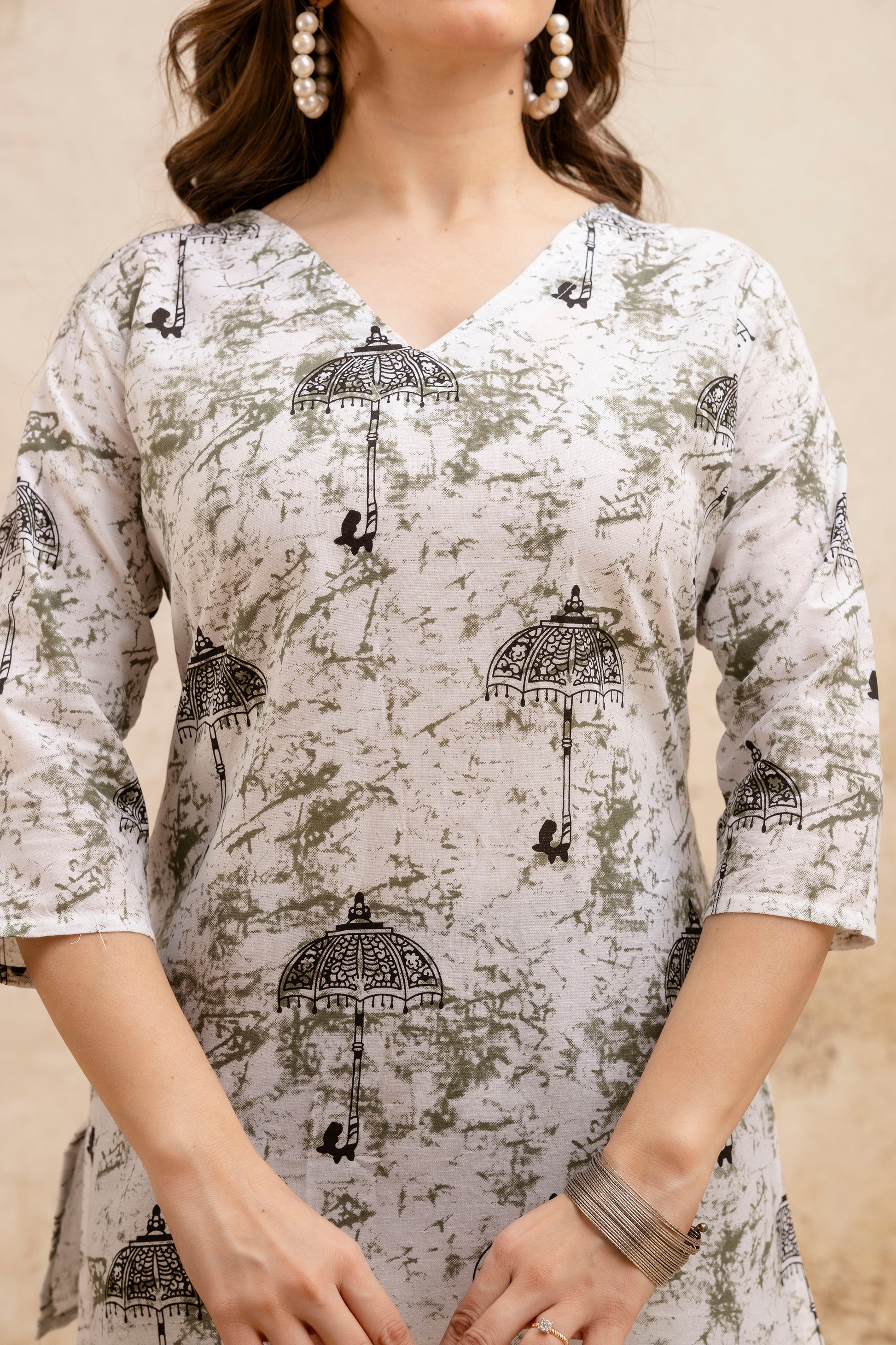 Beige Umbrella Print Pure Cotton Short Kurti.