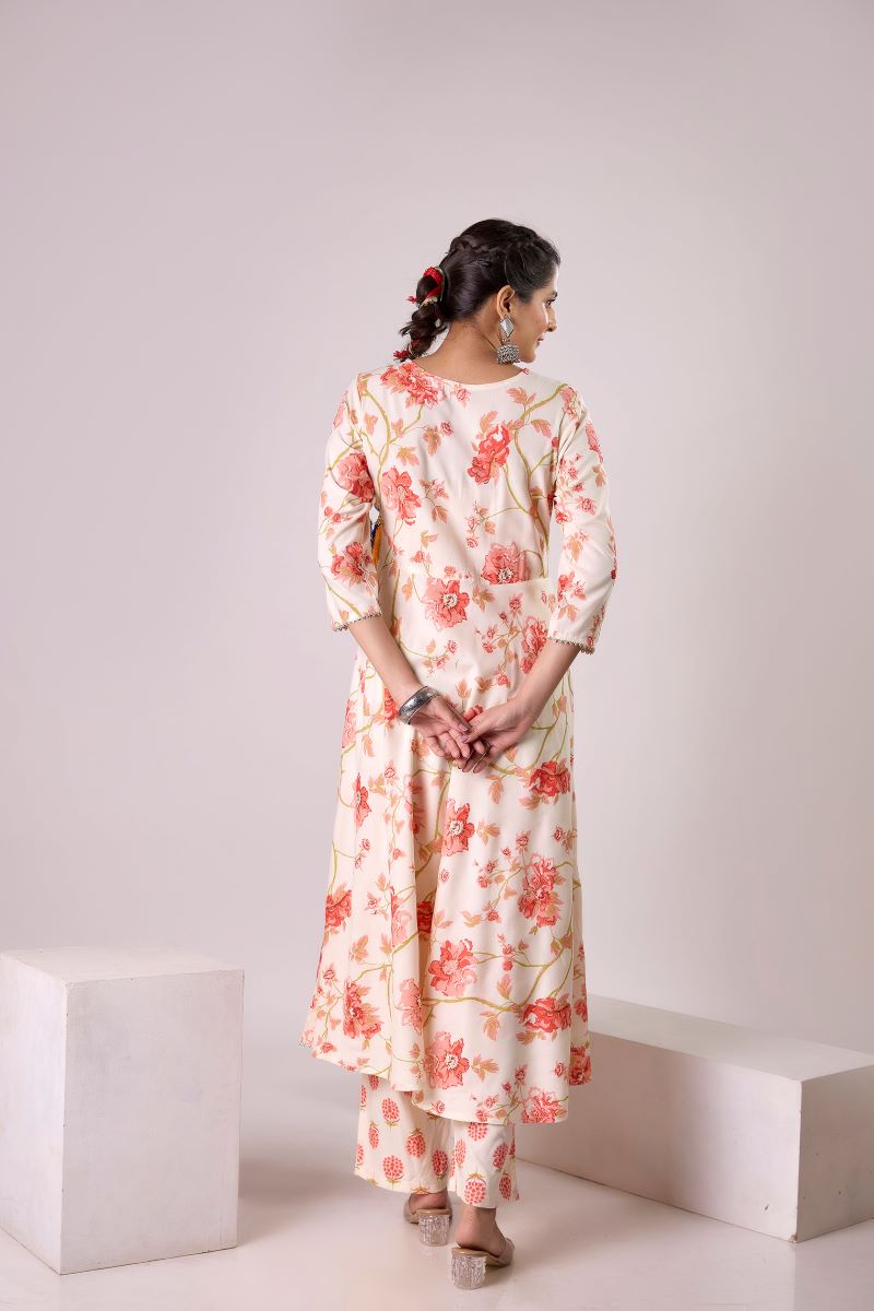 Orange Printed Embellished Kurta And Pant set.