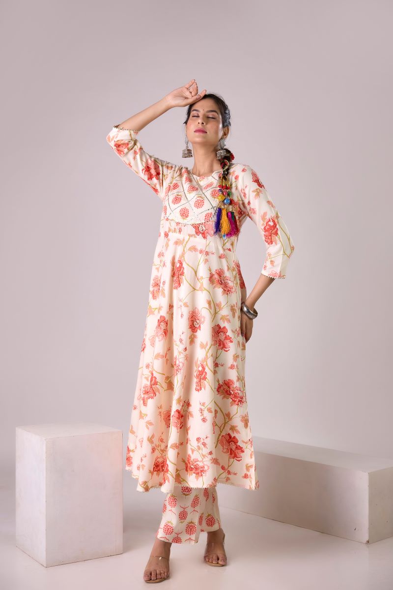 Orange Printed Embellished Kurta And Pant set.