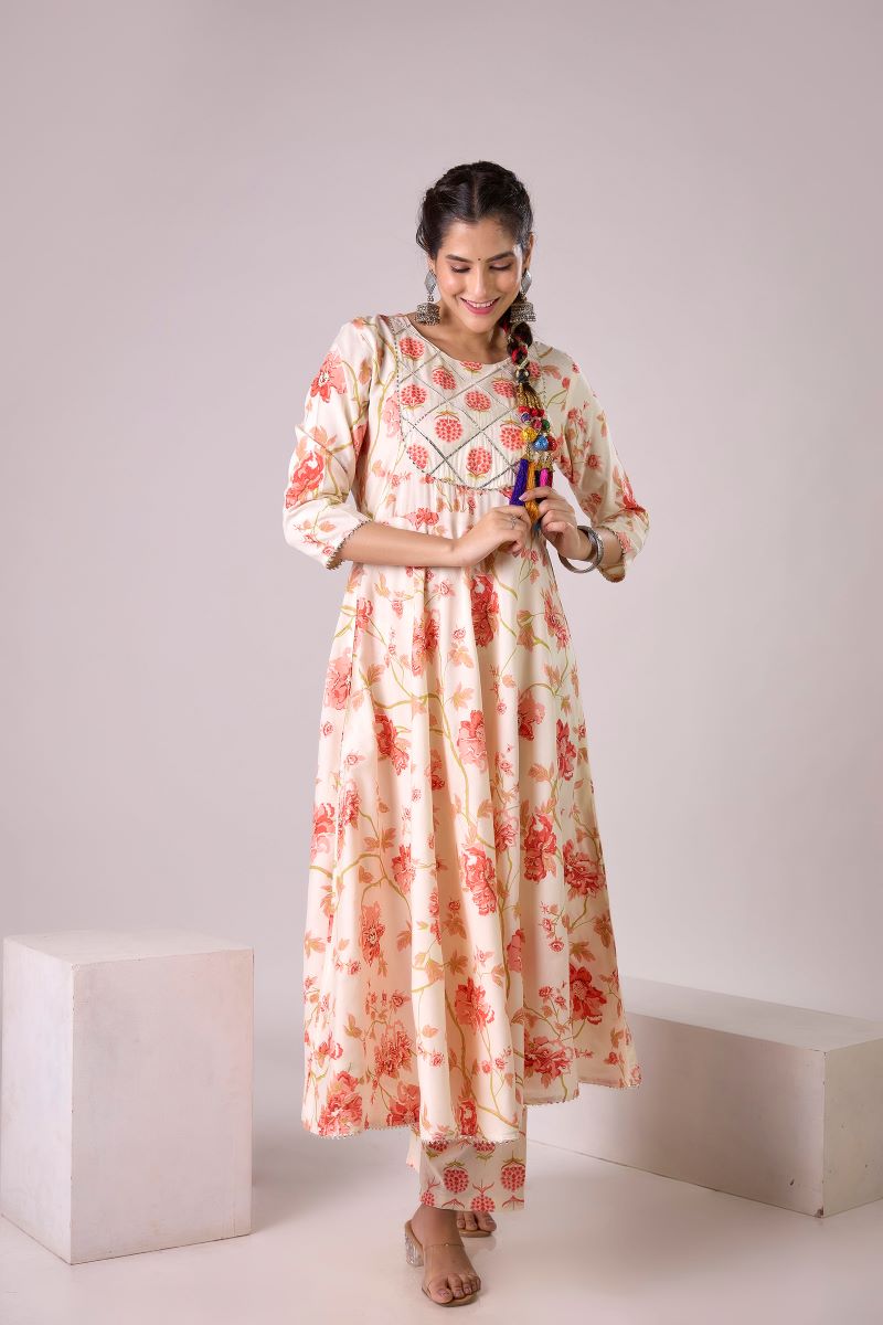 Orange Printed Embellished Kurta And Pant set.