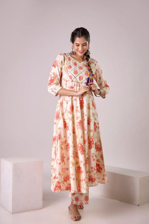 Orange Printed Embellished Kurta And Pant set.