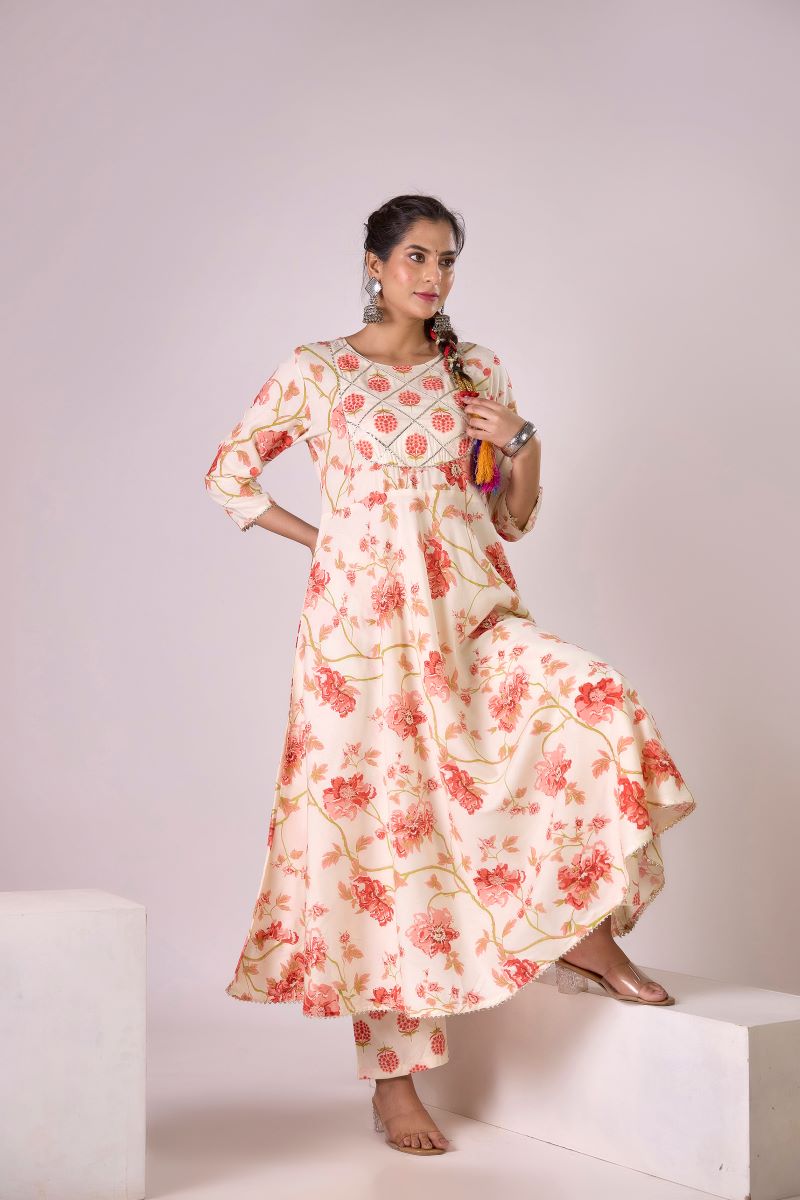 Orange Printed Embellished Kurta And Pant set.