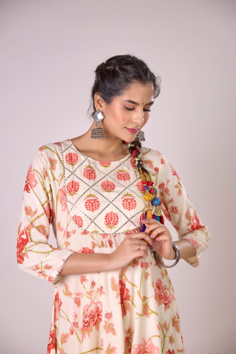 Orange Printed Embellished Kurta And Pant set.