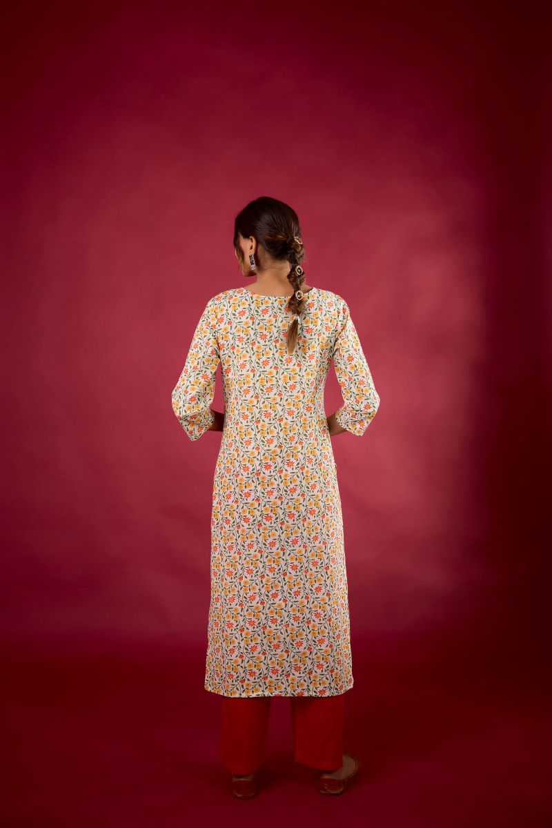 Yellow Floral Embroidered Cotton Straight Kurta.