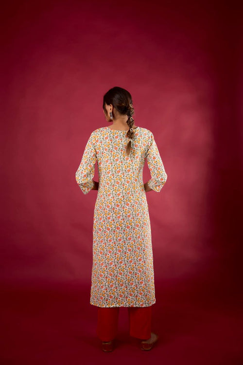 Yellow Floral Embroidered Cotton Straight Kurta.