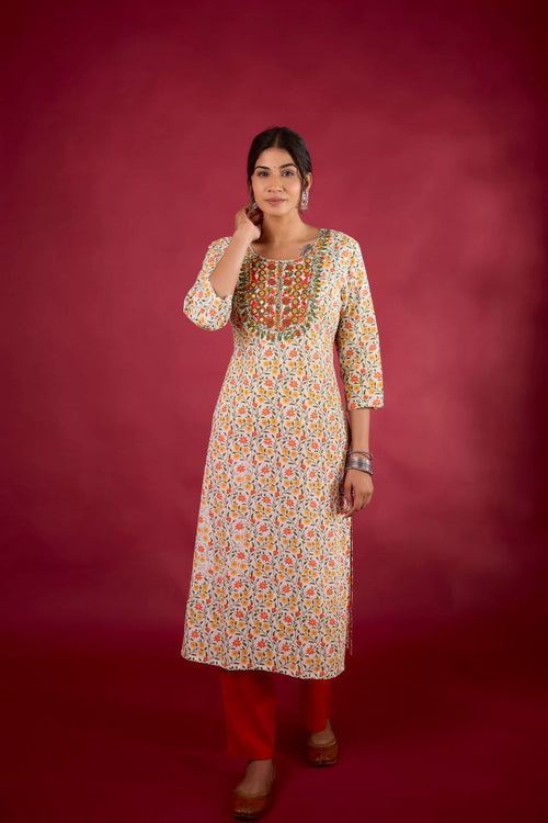 Yellow Floral Embroidered Cotton Straight Kurta.