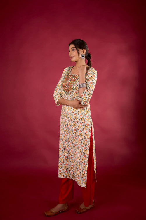 Yellow Floral Embroidered Cotton Straight Kurta.