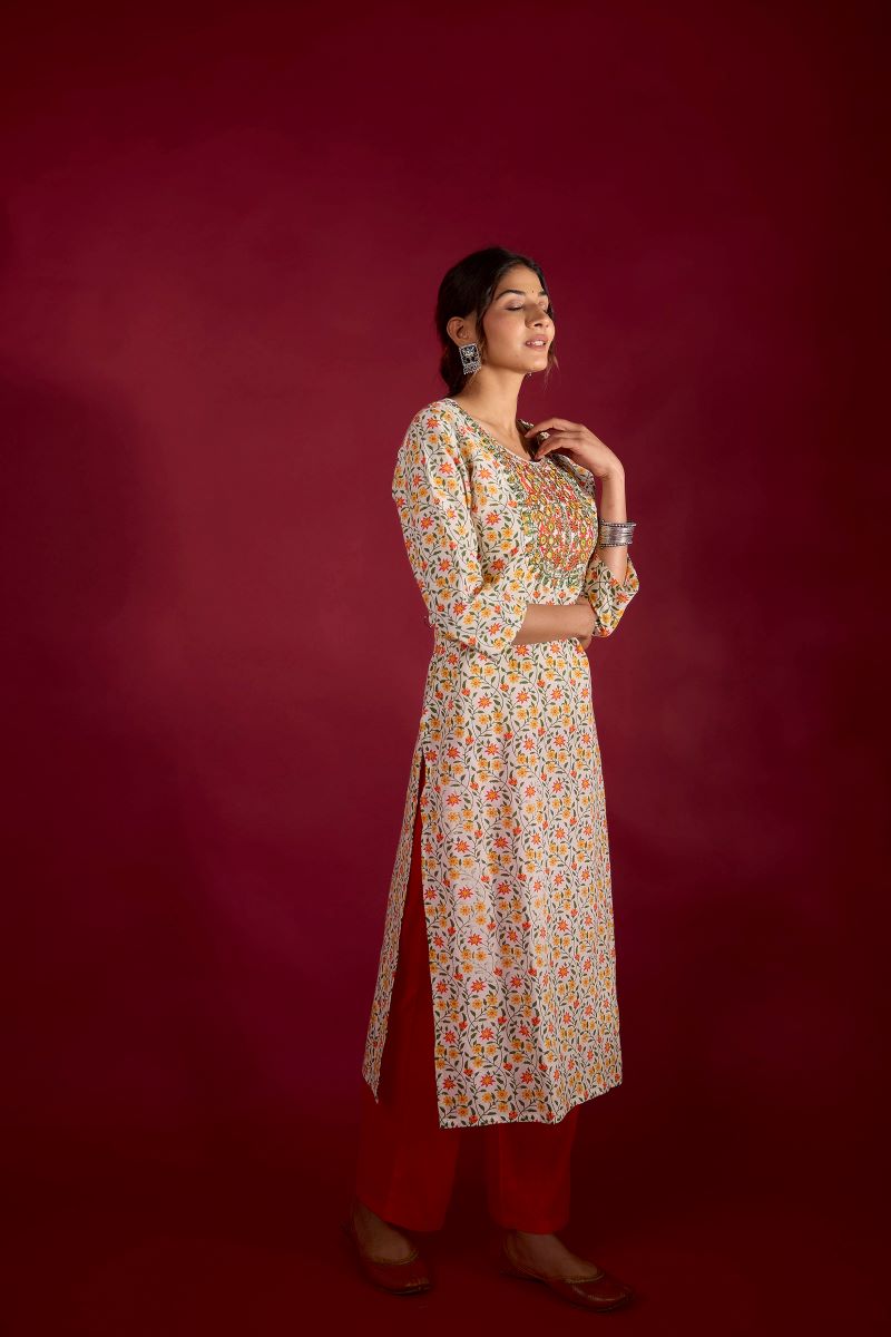 Yellow Floral Embroidered Cotton Straight Kurta.