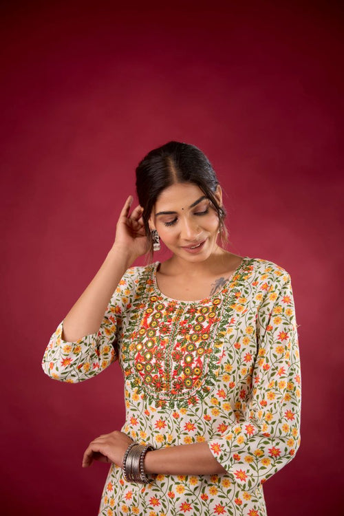 Yellow Floral Embroidered Cotton Straight Kurta.