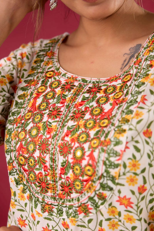 Yellow Floral Embroidered Cotton Straight Kurta.