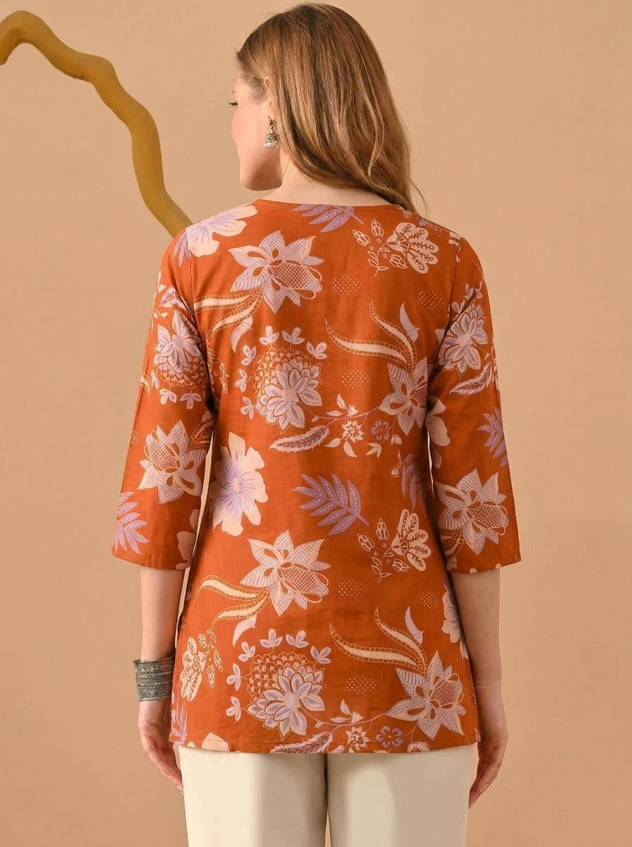 Floral Printed Orange Pure Cotton Short Kurti.