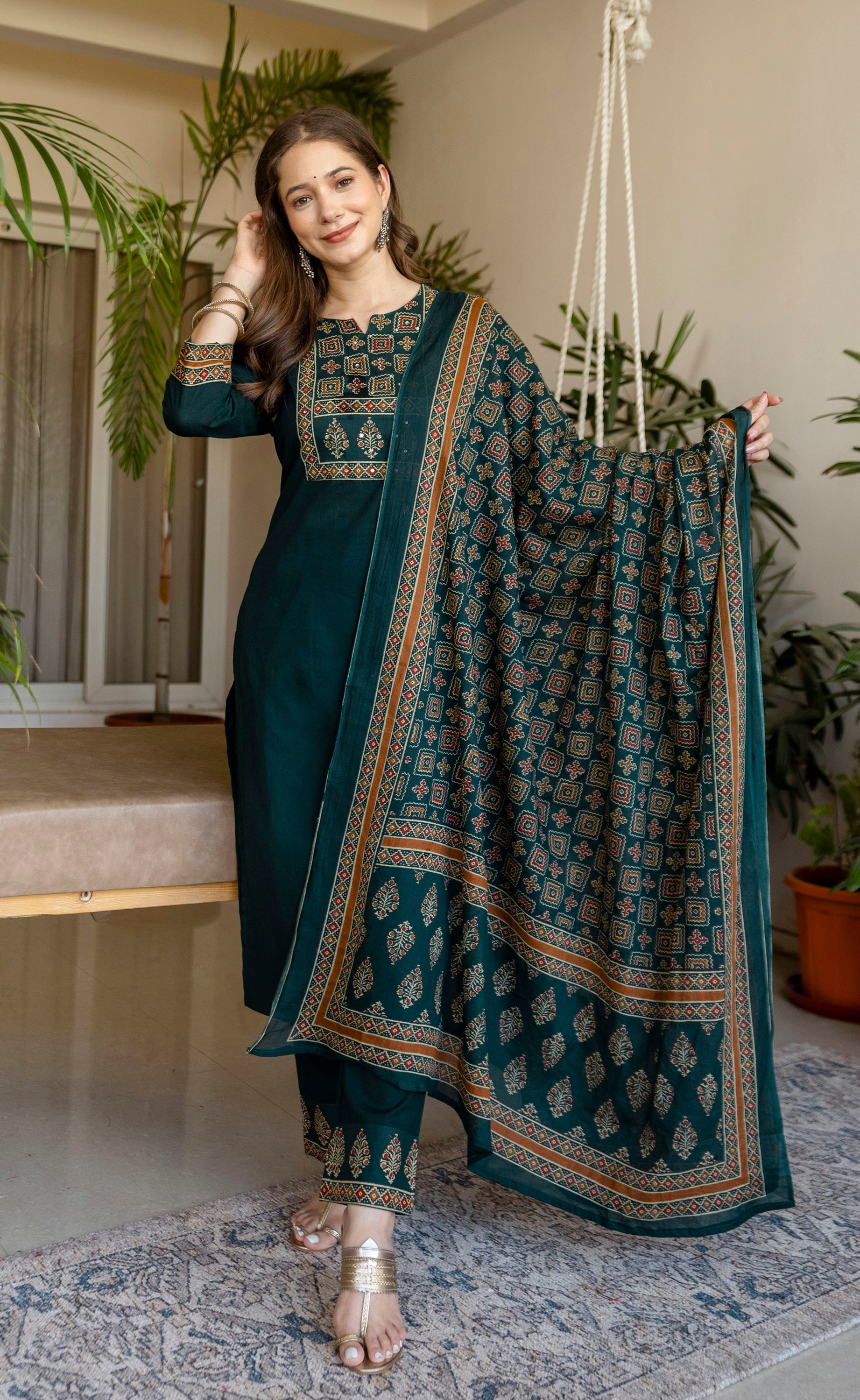 Dark green Printed Embroidered Kurta , Pant And Dupatta set.
