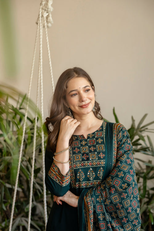 Dark green Printed Embroidered Kurta , Pant And Dupatta set.