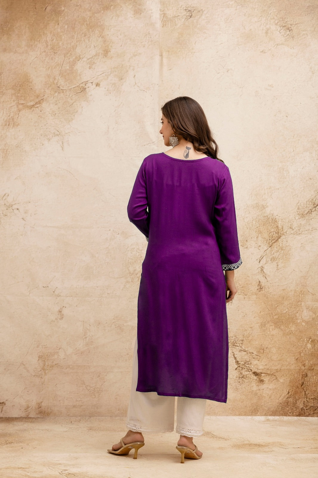 Purple Solid Embroidered Straight Kurta.